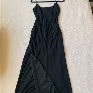 Long formal dress with beading and side slits.